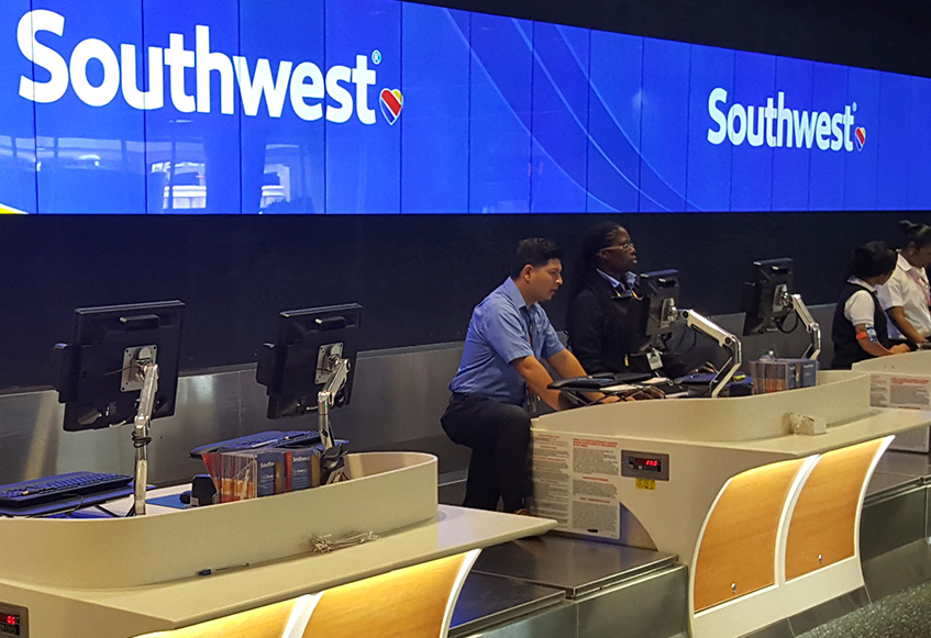 Check-in desks and backwall signage